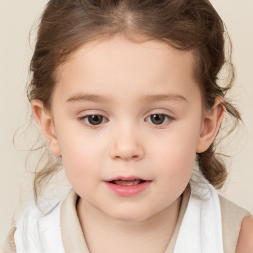 Neutral white child female with medium  brown hair and brown eyes