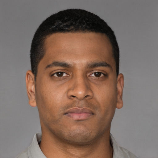 Neutral latino young-adult male with short  brown hair and brown eyes