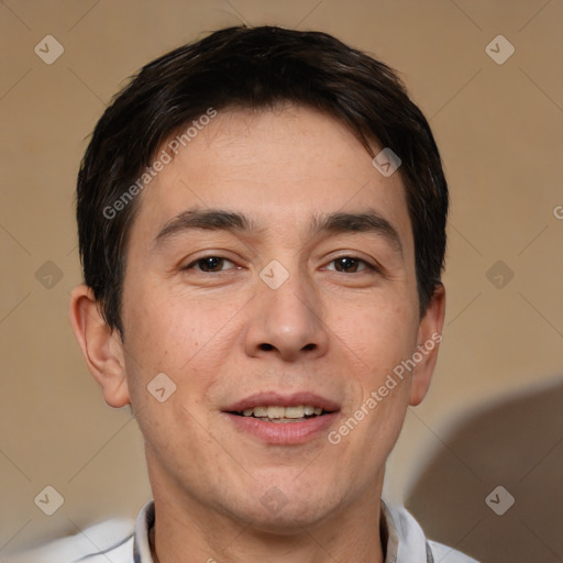 Joyful white adult male with short  brown hair and brown eyes