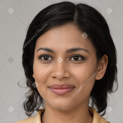 Joyful latino young-adult female with medium  black hair and brown eyes