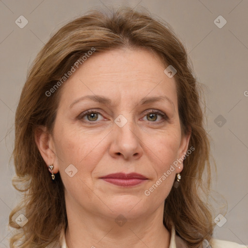 Joyful white adult female with medium  brown hair and grey eyes