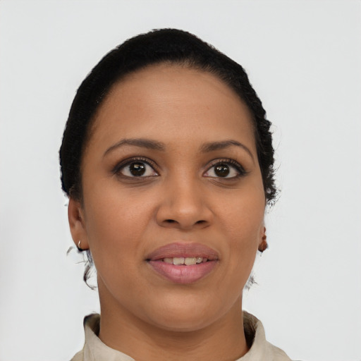 Joyful latino young-adult female with short  brown hair and brown eyes