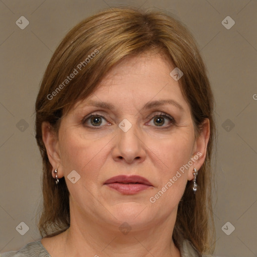 Joyful white adult female with medium  brown hair and brown eyes