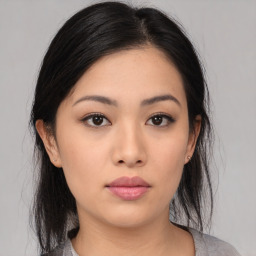 Neutral asian young-adult female with medium  black hair and brown eyes