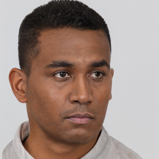 Neutral black young-adult male with short  brown hair and brown eyes