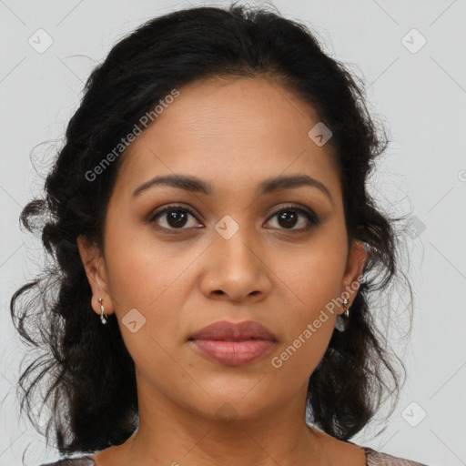 Joyful latino young-adult female with medium  brown hair and brown eyes