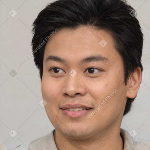 Joyful asian young-adult male with short  brown hair and brown eyes