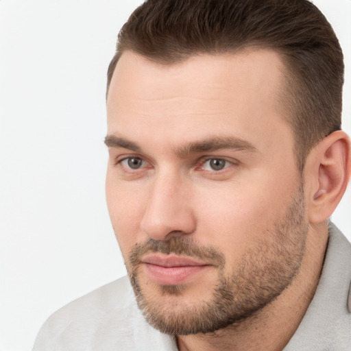 Neutral white young-adult male with short  brown hair and brown eyes