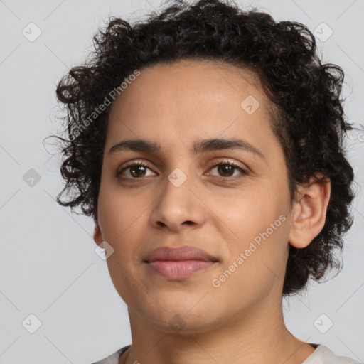 Joyful latino young-adult female with short  brown hair and brown eyes