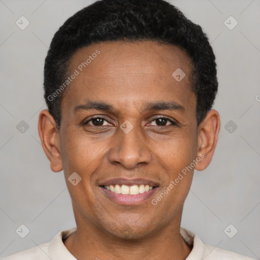 Joyful latino young-adult male with short  black hair and brown eyes