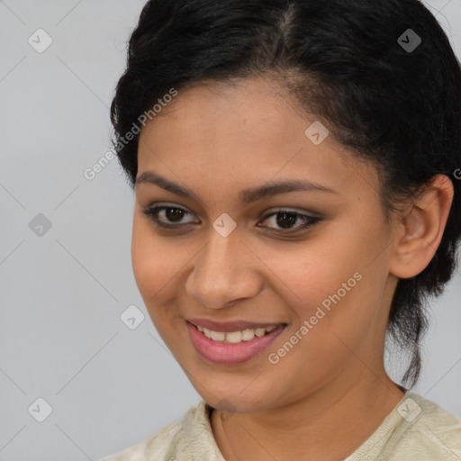 Joyful latino young-adult female with medium  brown hair and brown eyes