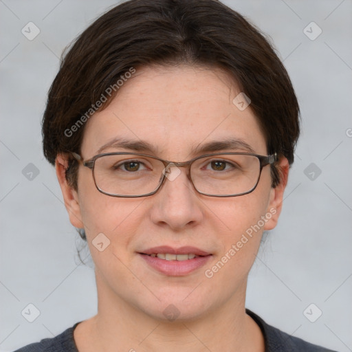 Joyful white adult female with short  brown hair and grey eyes