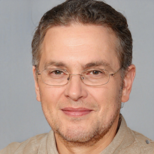 Joyful white middle-aged male with short  brown hair and brown eyes