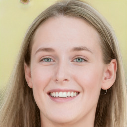 Joyful white young-adult female with long  brown hair and blue eyes