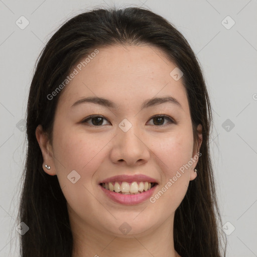 Joyful white young-adult female with long  brown hair and brown eyes