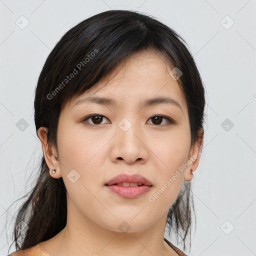 Joyful asian young-adult female with medium  black hair and brown eyes