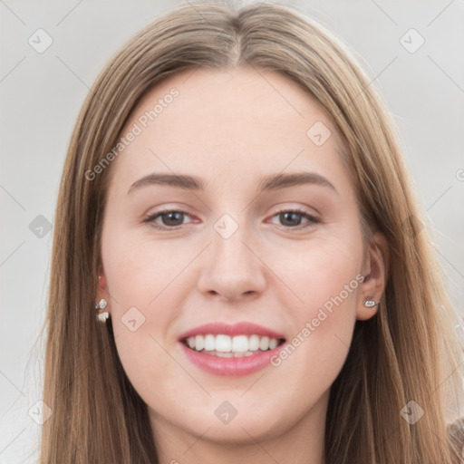 Joyful white young-adult female with long  brown hair and grey eyes