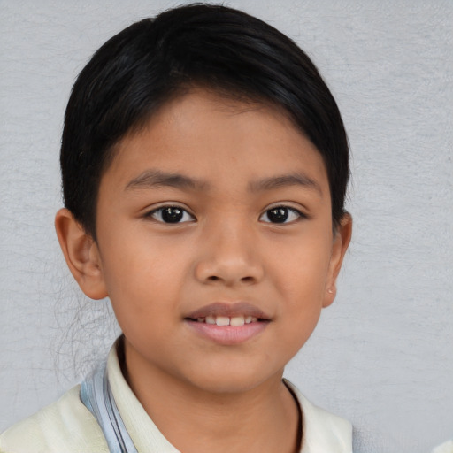Neutral asian child male with short  brown hair and brown eyes