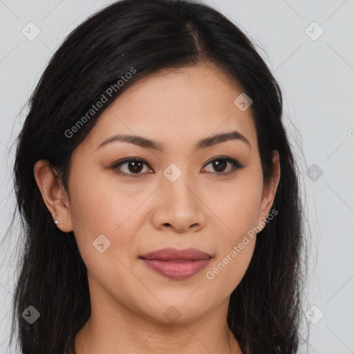 Joyful asian young-adult female with long  brown hair and brown eyes