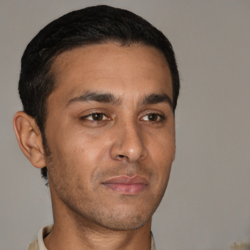 Neutral white young-adult male with short  brown hair and brown eyes