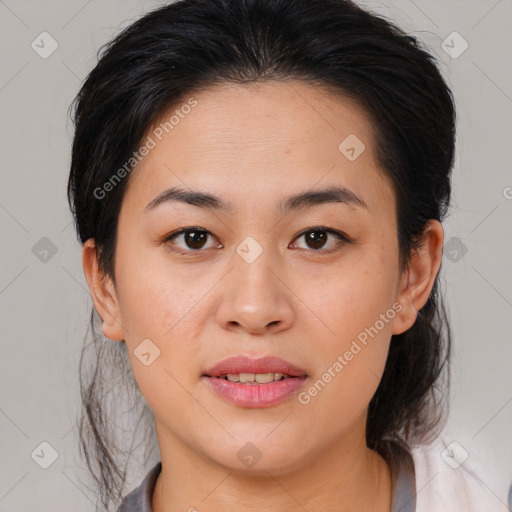 Joyful white young-adult female with medium  brown hair and brown eyes