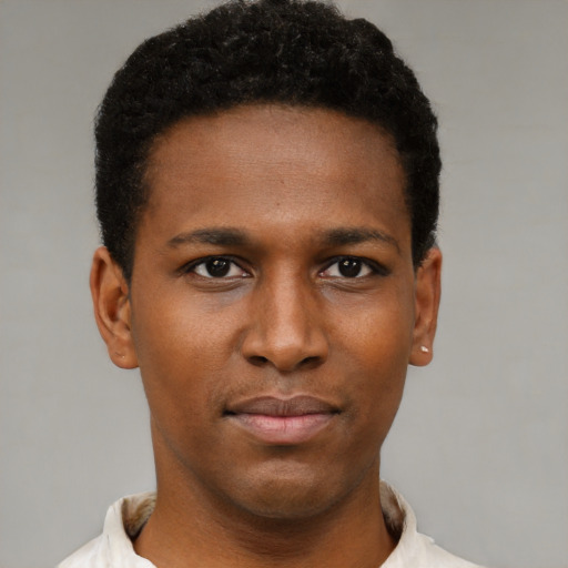 Neutral black young-adult male with short  brown hair and brown eyes