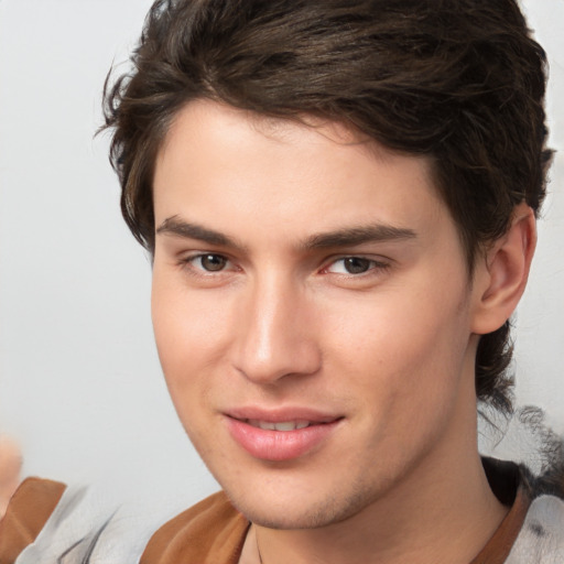 Joyful white young-adult male with medium  brown hair and brown eyes