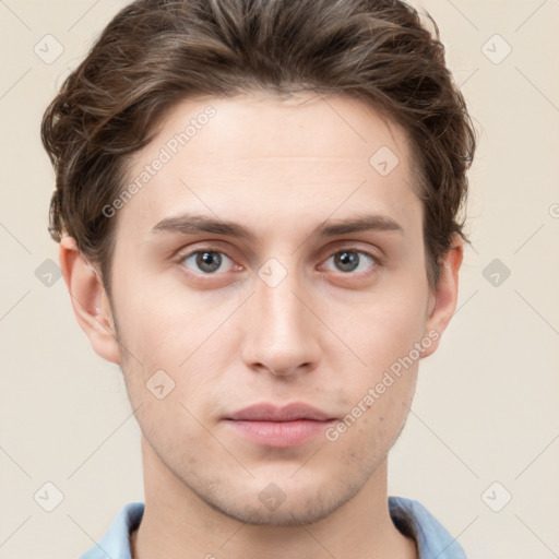 Neutral white young-adult male with short  brown hair and grey eyes