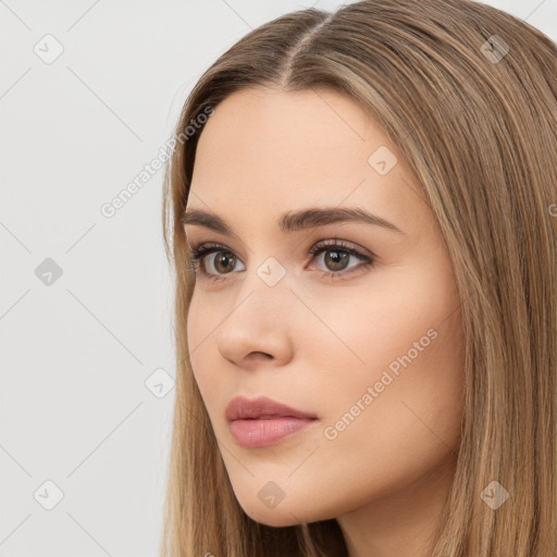 Neutral white young-adult female with long  brown hair and brown eyes