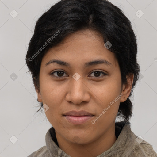 Joyful latino young-adult female with medium  brown hair and brown eyes