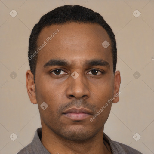 Neutral latino young-adult male with short  black hair and brown eyes