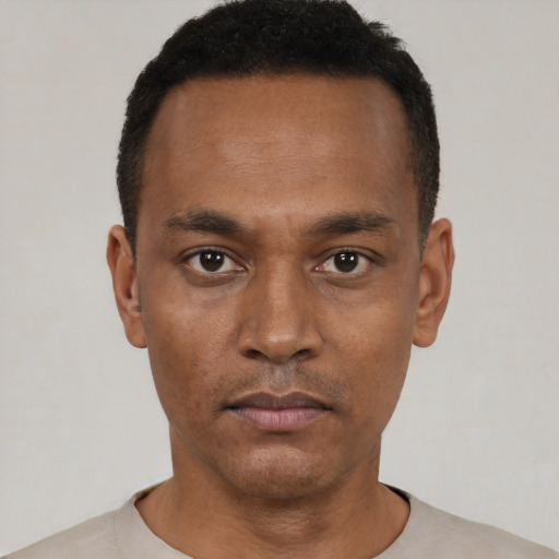 Neutral black young-adult male with short  black hair and brown eyes