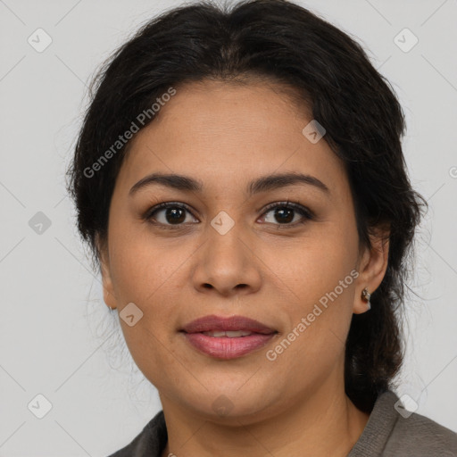Joyful latino young-adult female with medium  brown hair and brown eyes