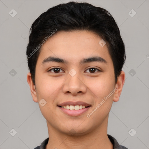 Joyful asian young-adult male with short  brown hair and brown eyes