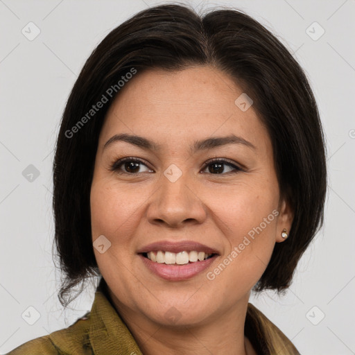 Joyful white adult female with medium  brown hair and brown eyes