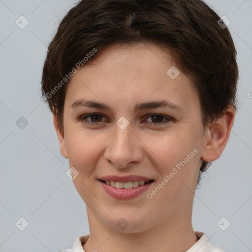 Joyful white young-adult female with short  brown hair and brown eyes