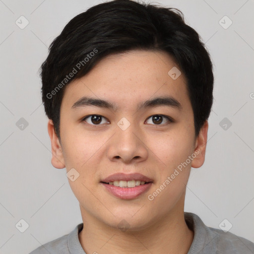 Joyful asian young-adult male with short  black hair and brown eyes