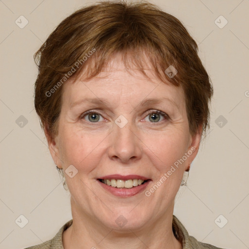 Joyful white adult female with medium  brown hair and grey eyes