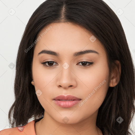 Joyful asian young-adult female with long  brown hair and brown eyes