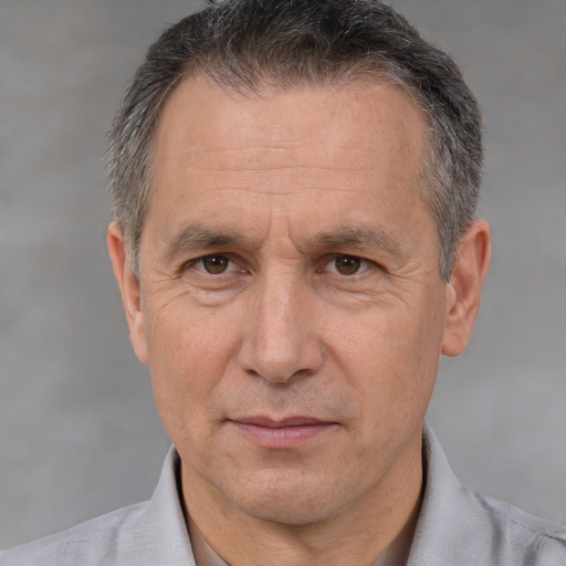 Neutral white middle-aged male with short  brown hair and brown eyes