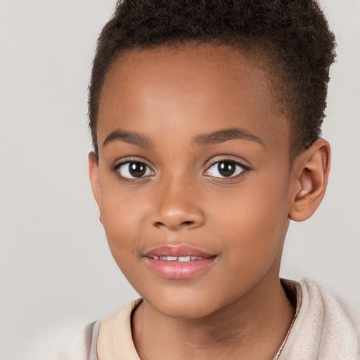 Joyful black child female with short  brown hair and brown eyes