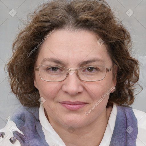 Joyful white adult female with medium  brown hair and blue eyes