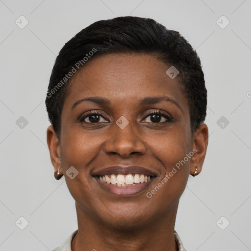 Joyful black young-adult female with short  brown hair and brown eyes