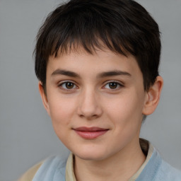 Joyful white child female with short  brown hair and brown eyes