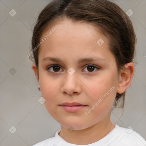 Joyful white child female with medium  brown hair and brown eyes