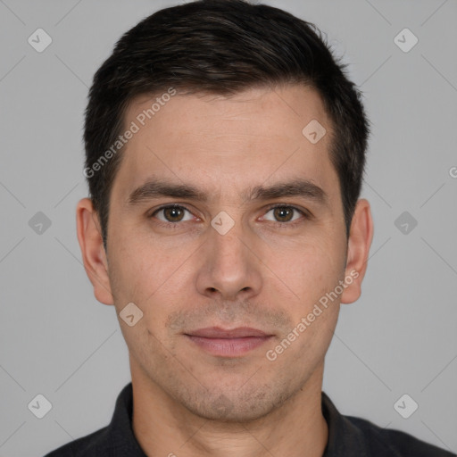 Joyful white adult male with short  brown hair and brown eyes