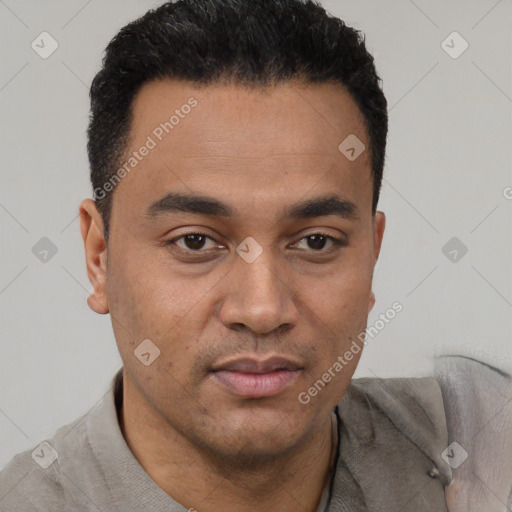 Neutral latino young-adult male with short  black hair and brown eyes