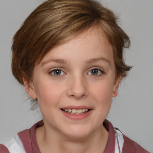 Joyful white child female with medium  brown hair and blue eyes