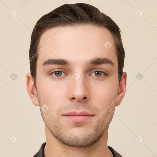 Neutral white young-adult male with short  brown hair and brown eyes