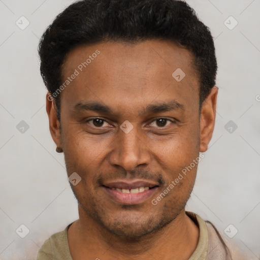 Joyful latino young-adult male with short  brown hair and brown eyes